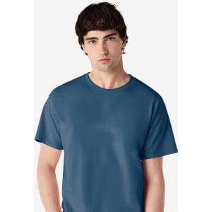 A blue Gildan Ultra Cotton adult T-shirt displayed on a male model, featuring a plain design and logo.