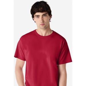 A red Gildan Ultra Cotton adult T-shirt displayed on a male model, featuring a simple design and a logo.