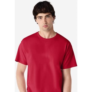 A red Gildan Ultra Cotton adult T-shirt, featuring a crew neck and short sleeves, worn by a model.