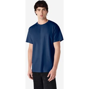 A model wearing a navy blue Gildan Ultra Cotton adult T-shirt. The shirt has a logo on it.