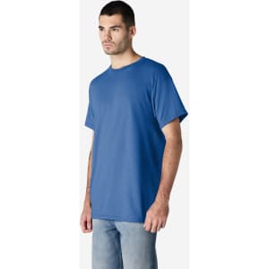 A blue Gildan Ultra Cotton adult T-shirt displayed on a model, featuring a relaxed fit and a logo.