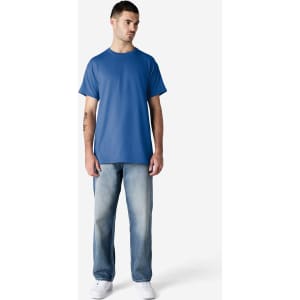 A blue Gildan Ultra Cotton adult t-shirt displayed on a model wearing light jeans and white shoes.