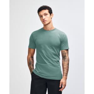 A unisex fine jersey short sleeve t-shirt in teal, featuring a round neckline and casual fit. It has a logo.