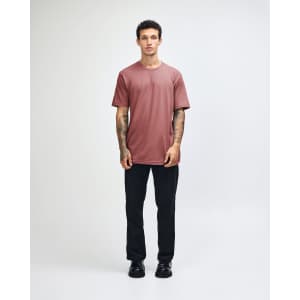 A unisex fine jersey short sleeve t-shirt in a dusty rose colour, featuring a simple design and a subtle logo.