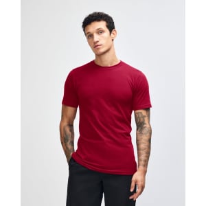 A unisex fine jersey short sleeve t-shirt in burgundy, featuring a logo on the front.