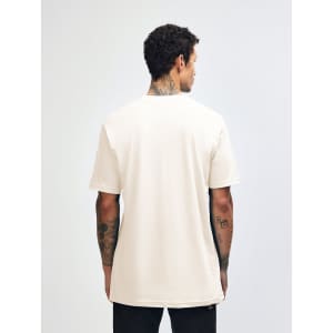 A cream-coloured unisex short sleeve T-shirt, viewed from the back, featuring a logo.
