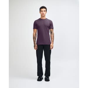 A unisex fine jersey short sleeve t-shirt in a deep purple colour, featuring a logo.