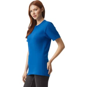 A unisex fine jersey short sleeve t-shirt in bright blue, featured on a model standing sideways.