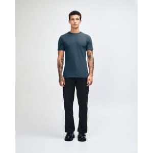 A unisex fine jersey short sleeve t-shirt in a dark teal colour, featuring a logo.