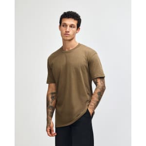 A unisex short sleeve t-shirt in khaki, featuring a simple design and a logo on the front.