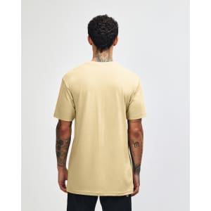 A unisex short sleeve t-shirt in a light beige colour, featuring a plain back and relaxed fit.