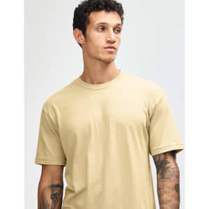 A unisex short sleeve t-shirt in a light yellow colour, featuring a simple design and a logo on the chest.