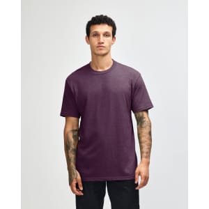 A unisex short sleeve T-shirt in a deep purple colour, featuring a relaxed fit and a visible logo.