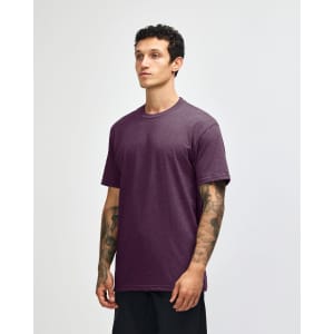 A unisex short sleeve t-shirt in a deep purple colour, featuring a simple design and a logo.