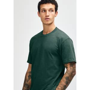 A unisex CVC short sleeve t-shirt in dark green, featuring a simple design and a branding logo.