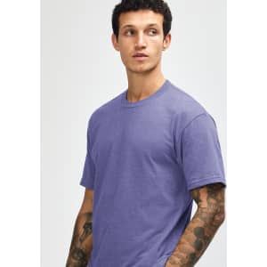 A unisex short sleeve T-shirt in a purple shade, featuring a subtle logo on the front.