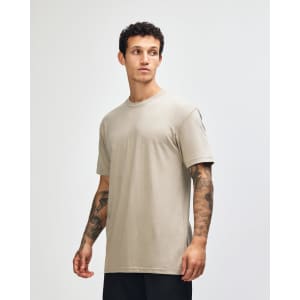 A unisex short sleeve T-shirt in a muted green colour with a simple design and a branding logo.