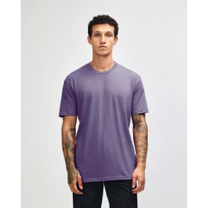 A unisex short sleeve T-shirt in a light purple colour. The shirt features a simple design and has a logo.