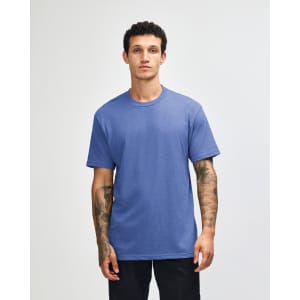 A unisex CVC short sleeve t-shirt in a vibrant blue colour, featuring a simple design and loose fit.