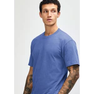 A unisex short sleeve t-shirt in a blue hue, featuring a casual fit and a logo on the chest.