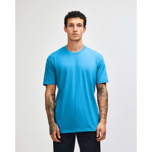 A blue unisex short sleeve T-shirt displayed on a model against a plain background, featuring a logo.