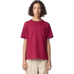 A maroon youth T-shirt with a crew neckline and short sleeves, featuring a subtle logo on the front.