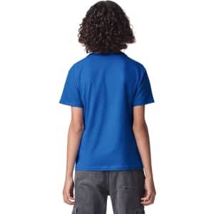 A blue youth t-shirt featuring a branding logo, shown from the back on a child with curly hair.