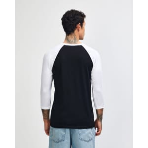 A black and white unisex raglan T-shirt featuring three-quarter sleeves and a logo on the back.