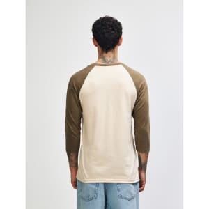 A unisex raglan T-shirt featuring a beige body and brown sleeves, with a plain design and no visible logo.
