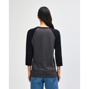 A unisex raglan T-shirt featuring a grey body and black sleeves, with a visible logo on the back.
