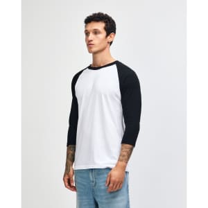 A black and white unisex raglan T-shirt with three-quarter sleeves. It features a logo on the sleeve.