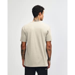 A beige unisex Henley T-shirt with short sleeves and a simple design, featuring a logo on the back.