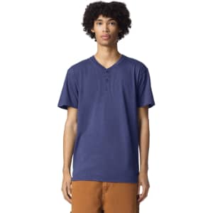 A navy unisex Henley T-shirt with a buttoned neck, featured on a model against a white background.