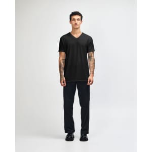 A black unisex V-neck T-shirt displayed on a model, featuring short sleeves and a fitted style.