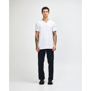 A white unisex V-neck T-shirt displayed on a model, featuring short sleeves and a logo.