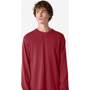 A long sleeve T-shirt in red, featuring a simple design and a crew neck. It includes a logo on the fabric.