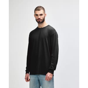 A long sleeve T-shirt in dark grey, featuring a simple design and a logo on the front.