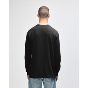 A black long sleeve t-shirt displayed on a model, featuring a simple design and a logo on the back.