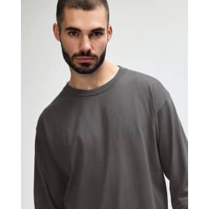 A long sleeve adult t-shirt in grey, featuring a simple design and a logo on the shirt.