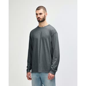 A dark navy long sleeve t-shirt is displayed on a model, featuring a logo on the sleeve.