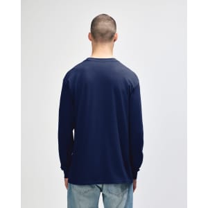 A navy blue long sleeve t-shirt for adults, featuring a simple design and a logo on the garment.