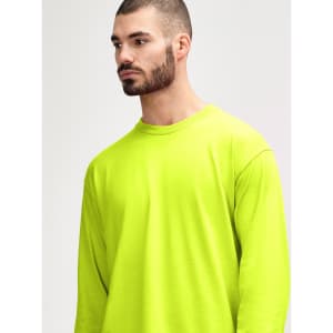 A bright yellow long sleeve t-shirt with a relaxed fit. It features a logo on the front.