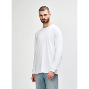 A white long sleeve T-shirt for adults, featuring a simple design and a logo on the front.