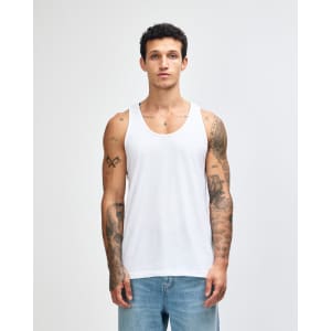 A unisex fine jersey tank in white, featuring a simple design and a logo on the garment.