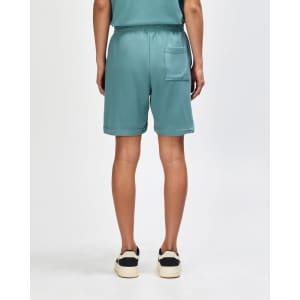 Teal unisex gym shorts with an elastic waistband and a single back pocket. Features branding on the garment.