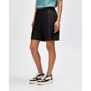 Unisex black pique gym shorts featuring an elastic waistband, drawstring, and side pockets.