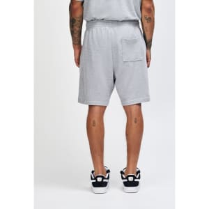 Grey unisex gym shorts with an elastic waistband and a back pocket, featuring a logo.