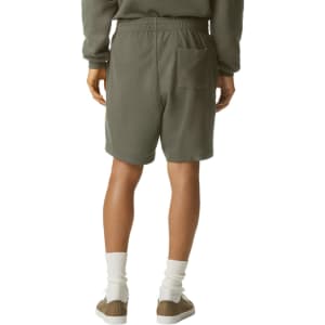Unisex gym shorts in olive green, featuring an elastic waistband and a back pocket. Includes a logo.