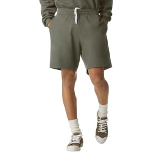 Unisex pique gym shorts in olive green with an elastic waistband and side pockets. Features a logo on the waistband.