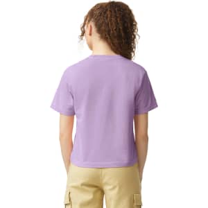 A women's heavyweight boxy T-shirt in light purple, featuring a simple design and short sleeves, with a logo.